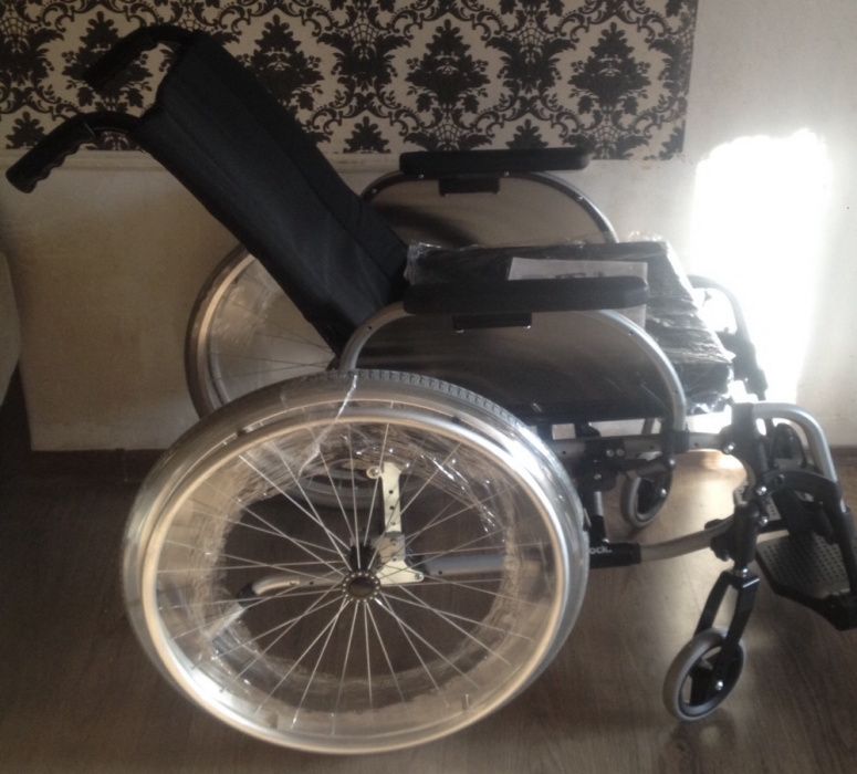 Германская инвалидная кресло-коляска фирма"Ottobock"с откидной спинкой