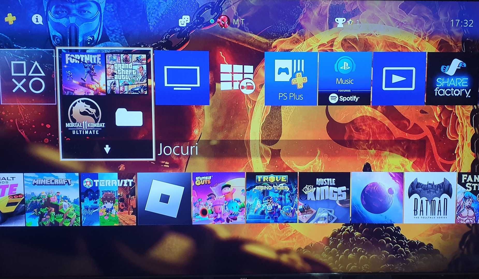 25 jocuri + PS4 SLIM cu GTA V, Fortnite, Mortal Kombat 11, 2 Manete