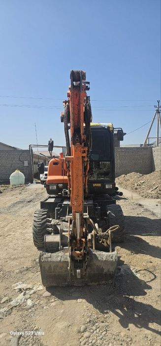 Экскаватор хизмати   Ekskavator Hizmati