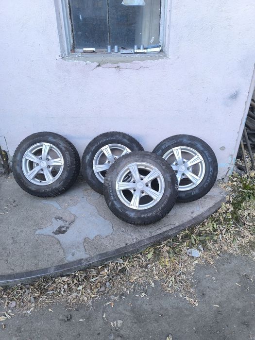 Продам резину с дисками Мазда 626