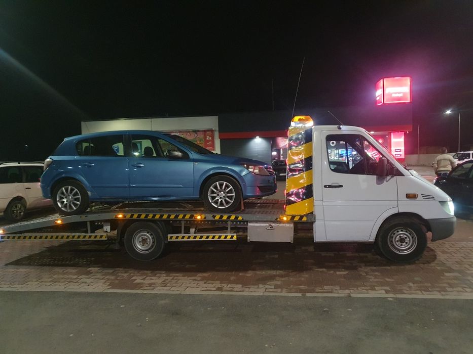 Tractari auto 24 /24 la datorie