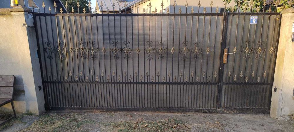Poarta culisanta fier forjat