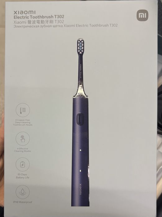 Электронная зубная щетка