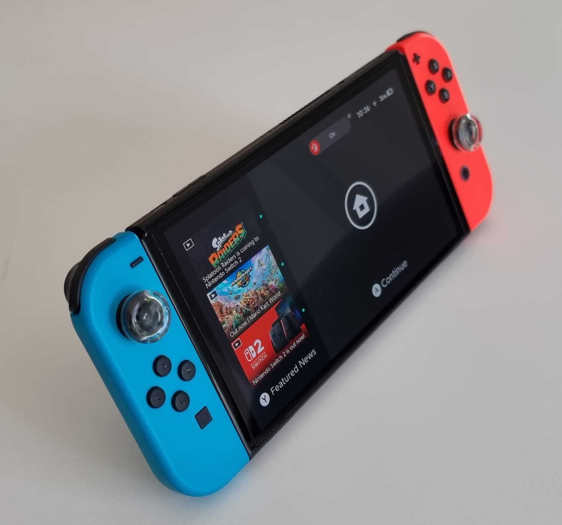Nintendo Switch OLED (RED & BLUE JOY-CONS)- ca nou + accesorii premium