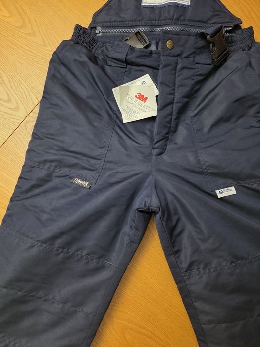 Продам новый зимний комбинезон