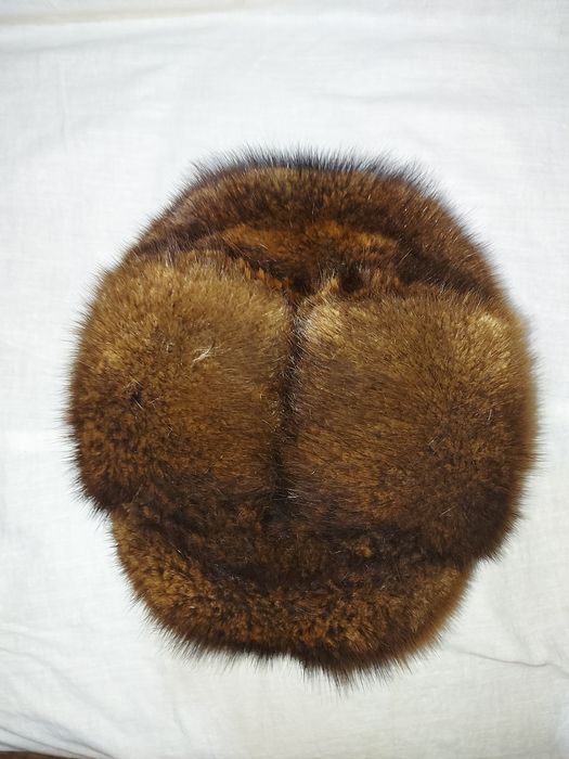 Порлдам   шапку  норкуваю  57  размер