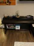 Pianul Yamaha CLP-320 combina claviatura Graded Hammer