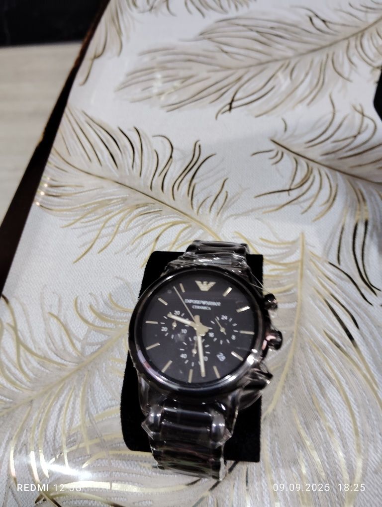 Часи ARMANI emporio