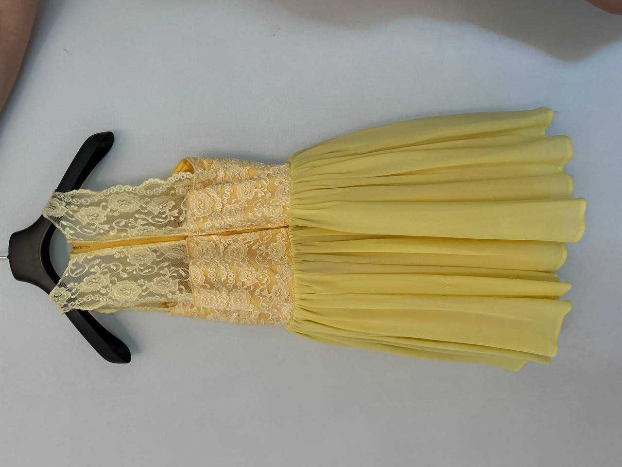 Ярко- желтое  праздничное платье для девочки  (11-12лет)