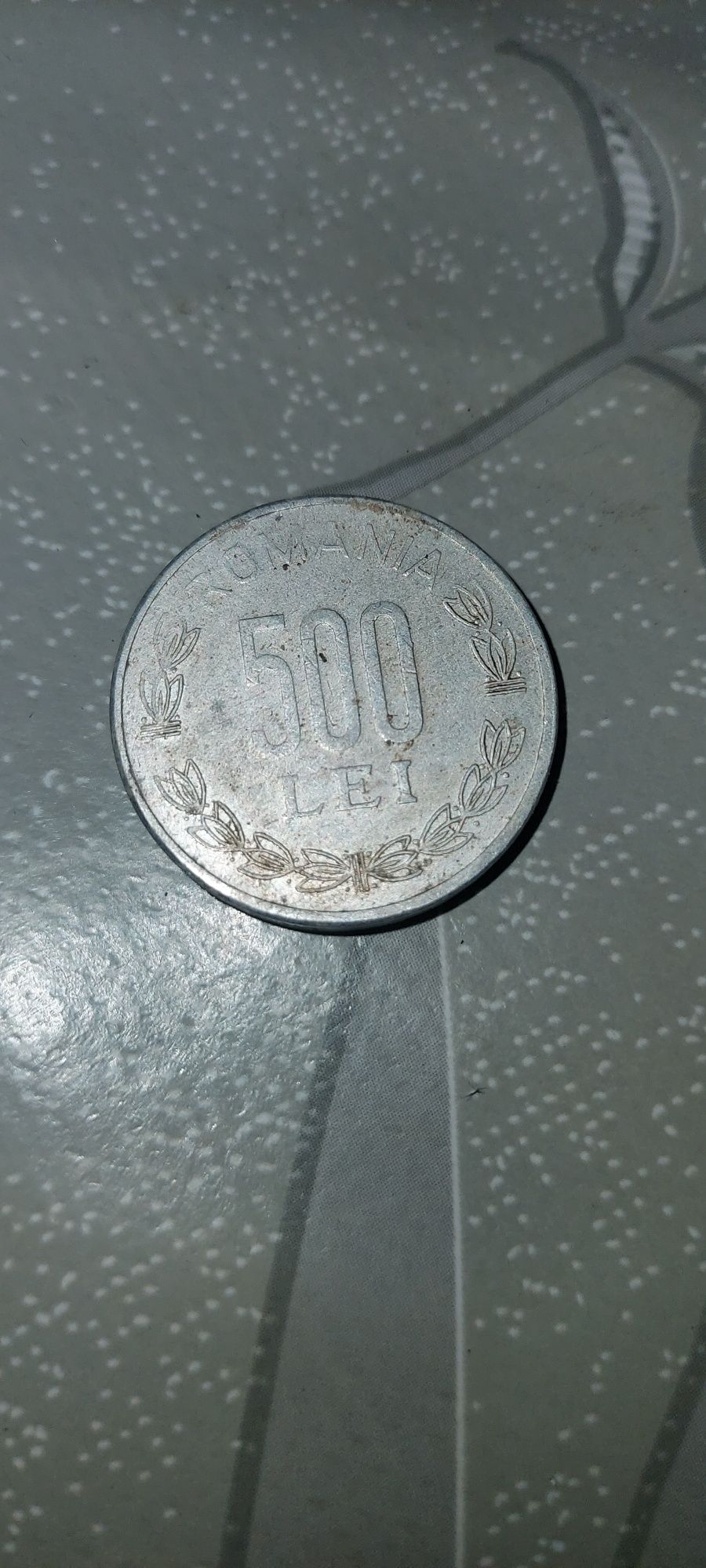 Vand monedă de 500 de lei 1999