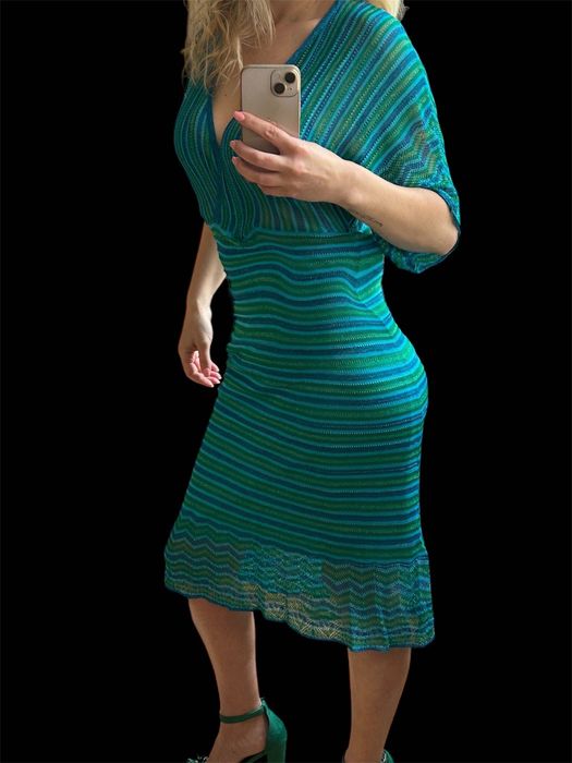 MNG рокля от лурекс с отворени детайли