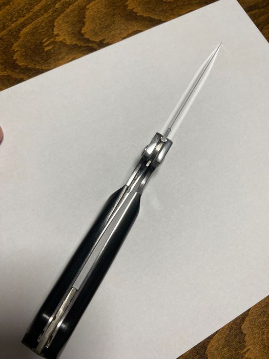 Сгъваем нож с текстилен калъф.