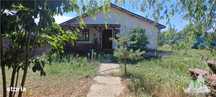 Casa pe parter 3 camere, teren 512mp, foisor, terasa, magazie, cu toat