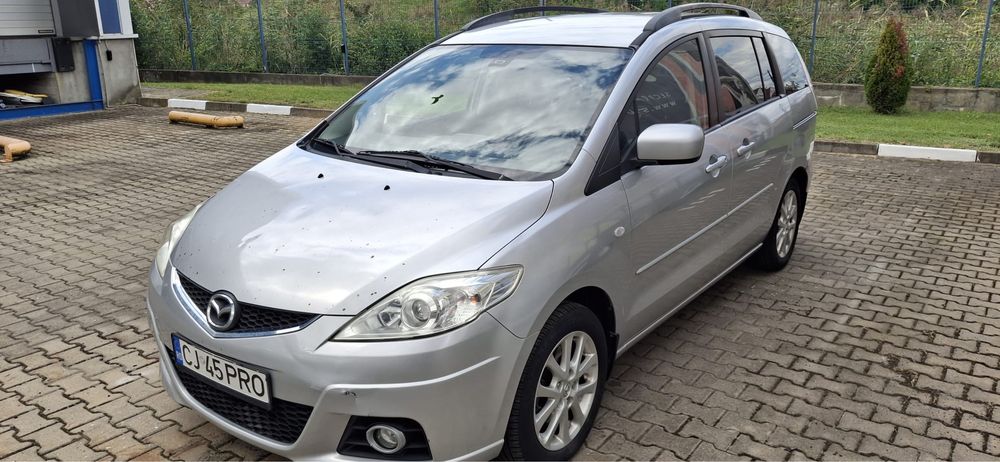 Vand MAZDA 5 din 2009 cu 7 locuri.