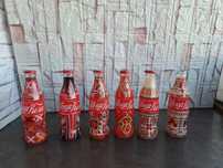 празни шишета,ботилки на Кока кола/Coca cola