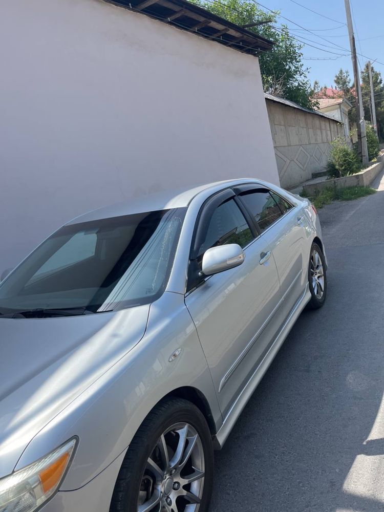 tayota camry ideal holatta qarap haydalgan