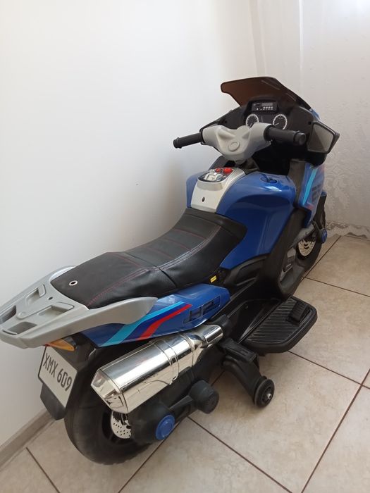 Vând motocicleta electrica copii