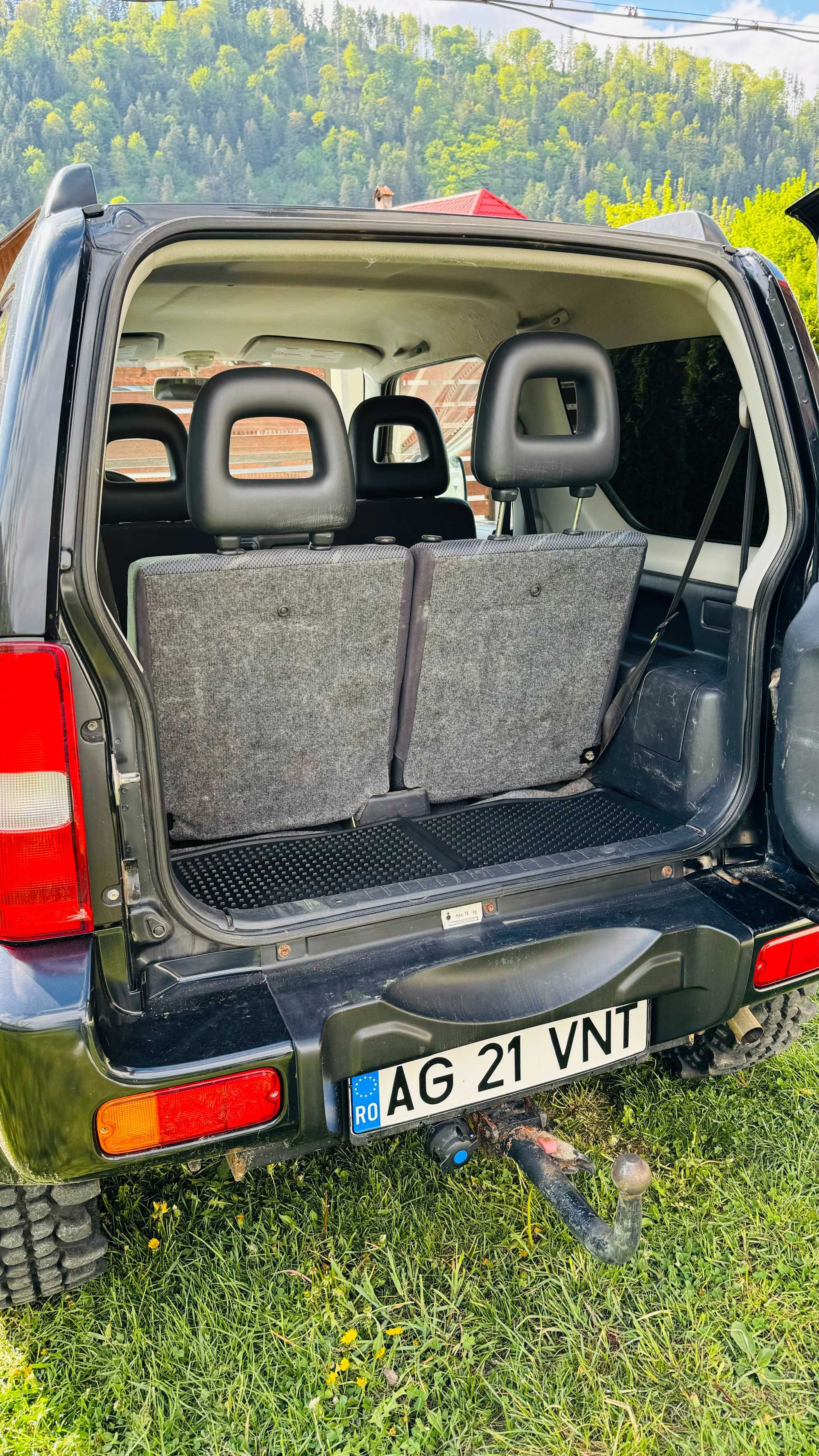 Vand Suzuki Jimny, negru, 1.3 benzina, 4WD