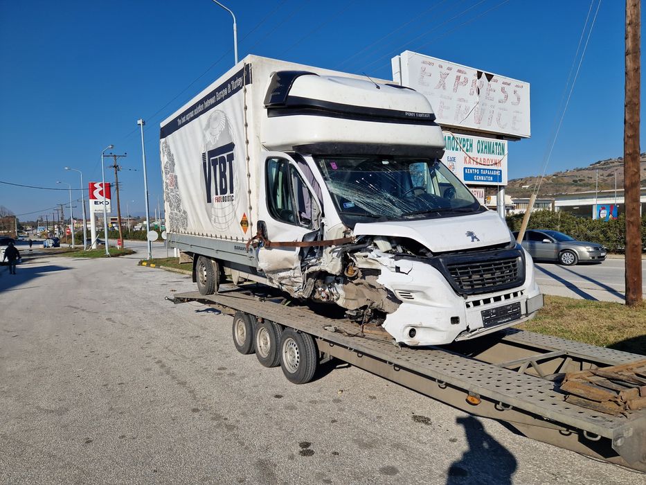 Tractari auto transport Romania Spania pe platforma dube utilaje