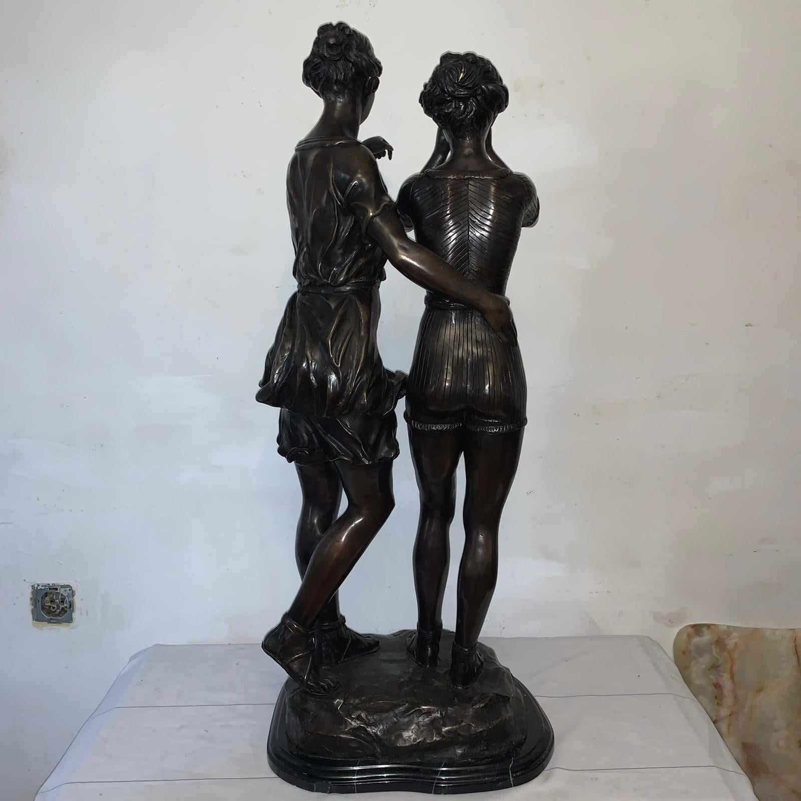 Statuie din bronz cu doua fete