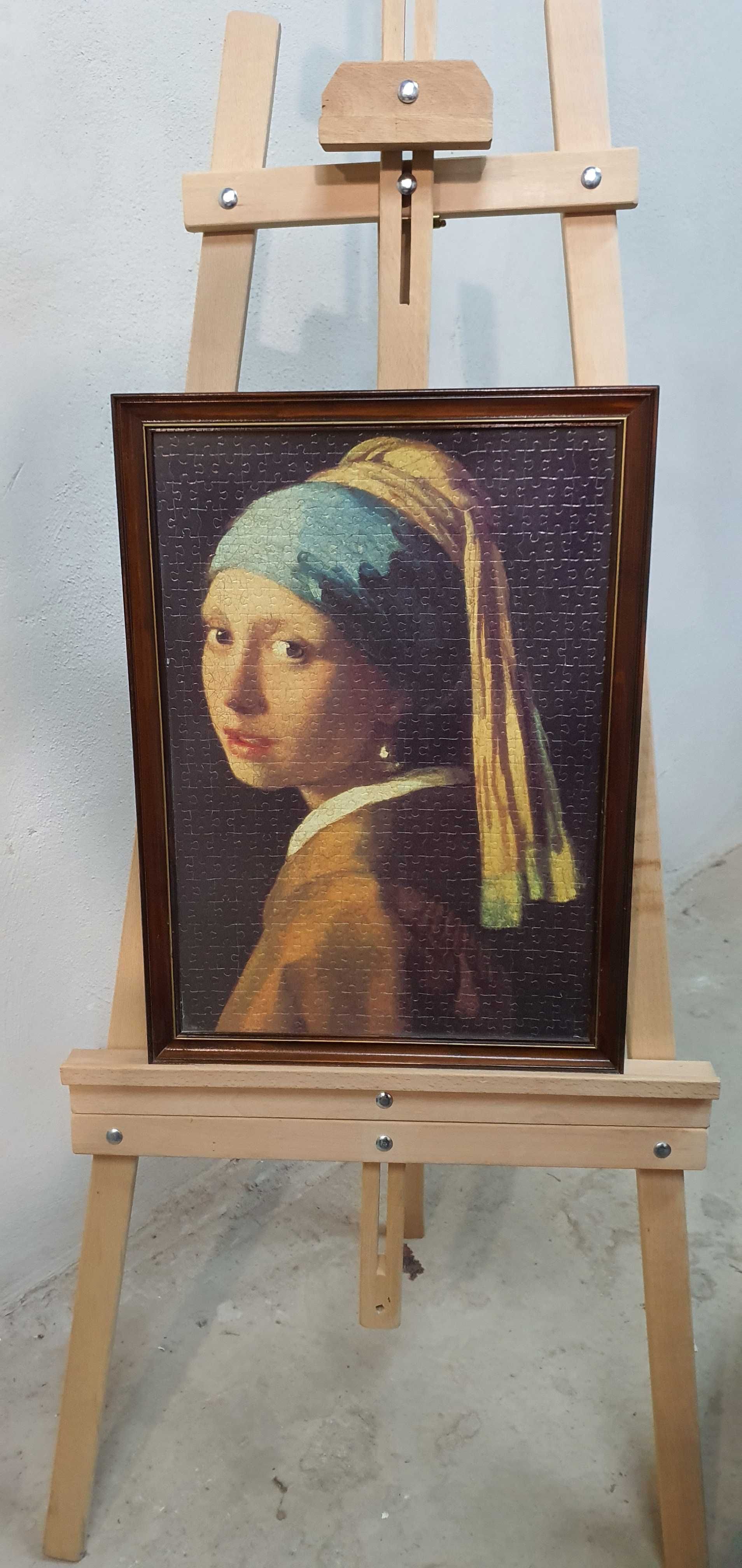 Картина от пъзел в рамка със стъкло.Момиче с перлена обеца.