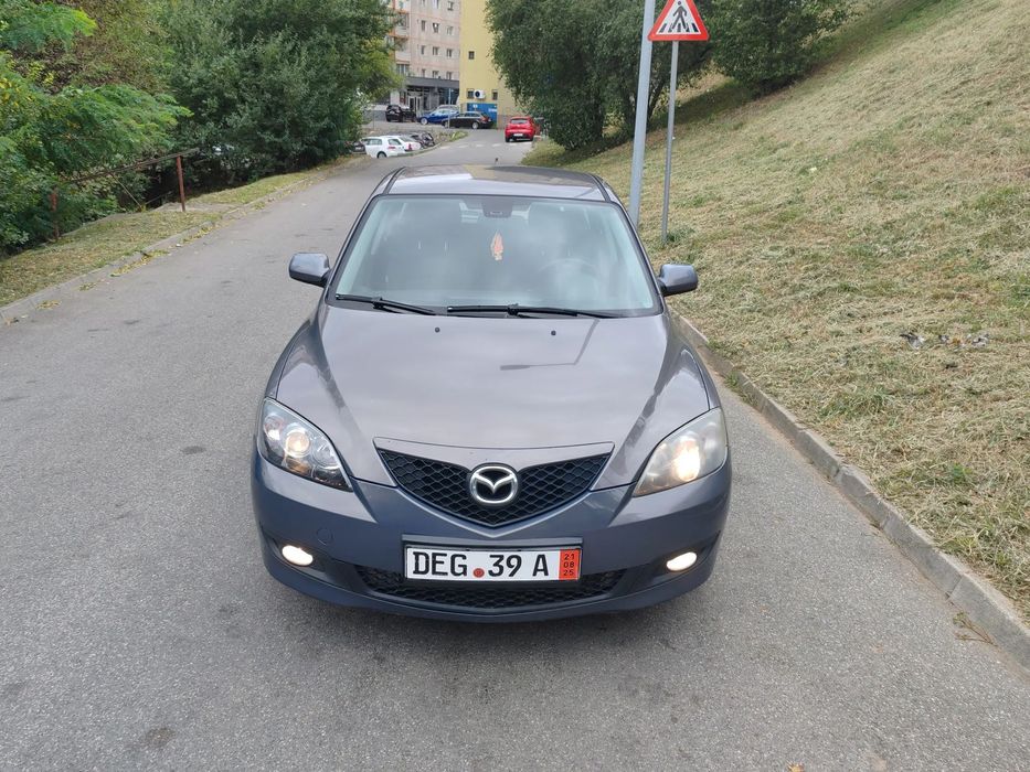 Volkswagen Polo Mazda 3 -1.6D