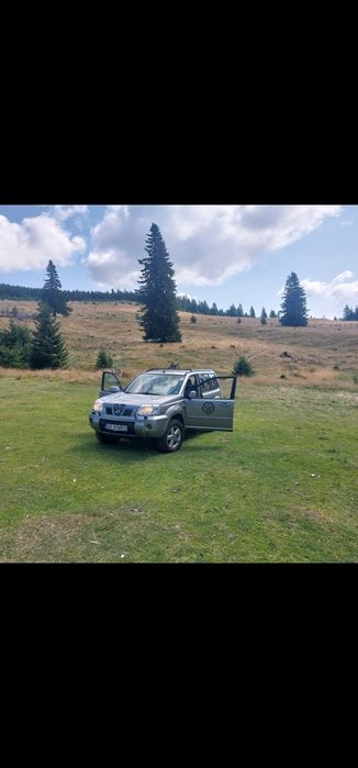 Nissan x trail 2006        ( schimb cu basculabila sau escavator )