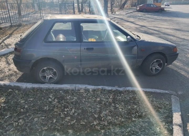 Продам машину Мазда 323