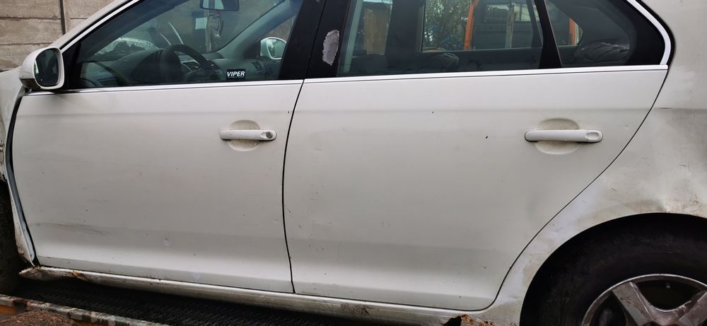 Usa portiera stanga dreapta fata spate vw jetta alb LR9A