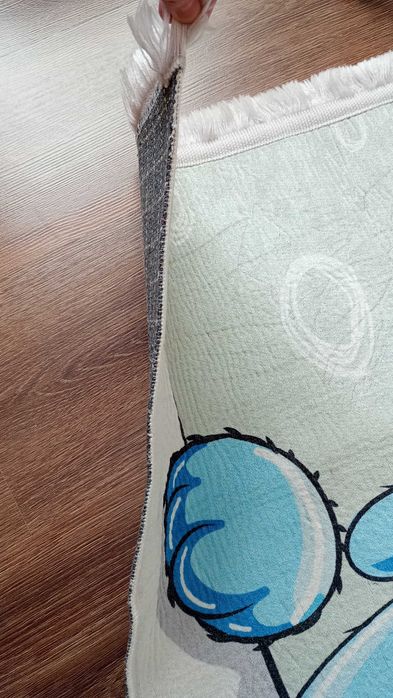 Детско килимче 65 на 120см.