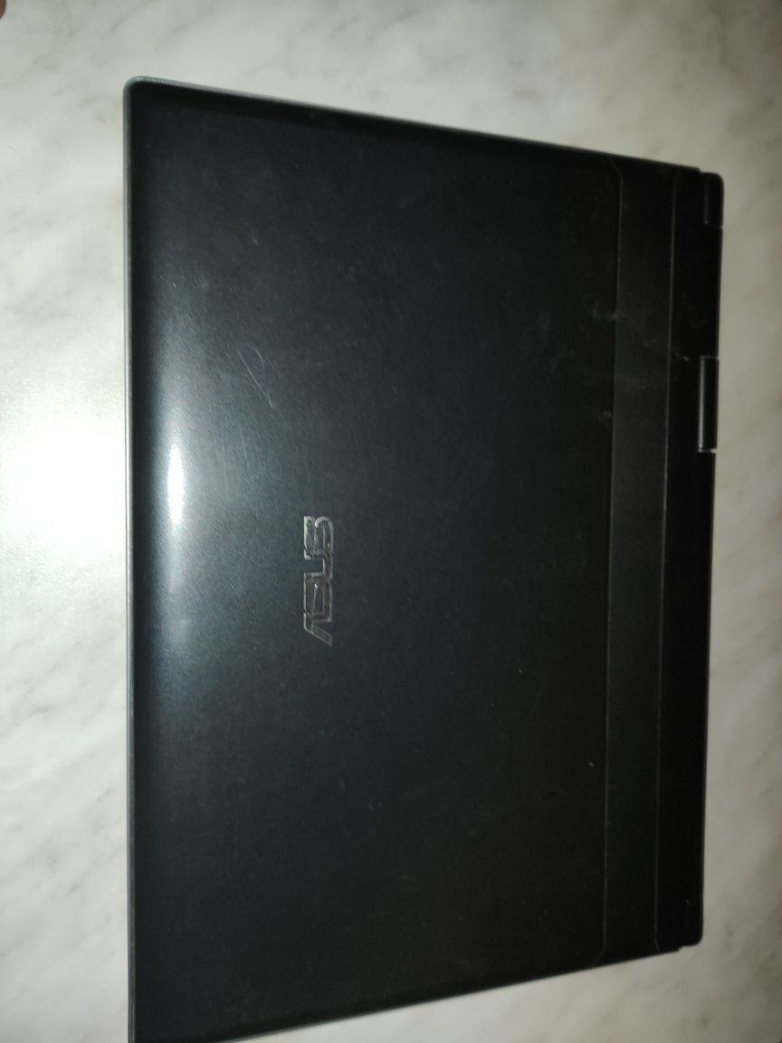 Ноутбук Asus динозавр