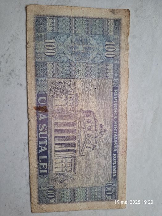 Moneda 20 pence, Elizabeth I', 1982 si bancnota 100 lei cu Balcescu
50