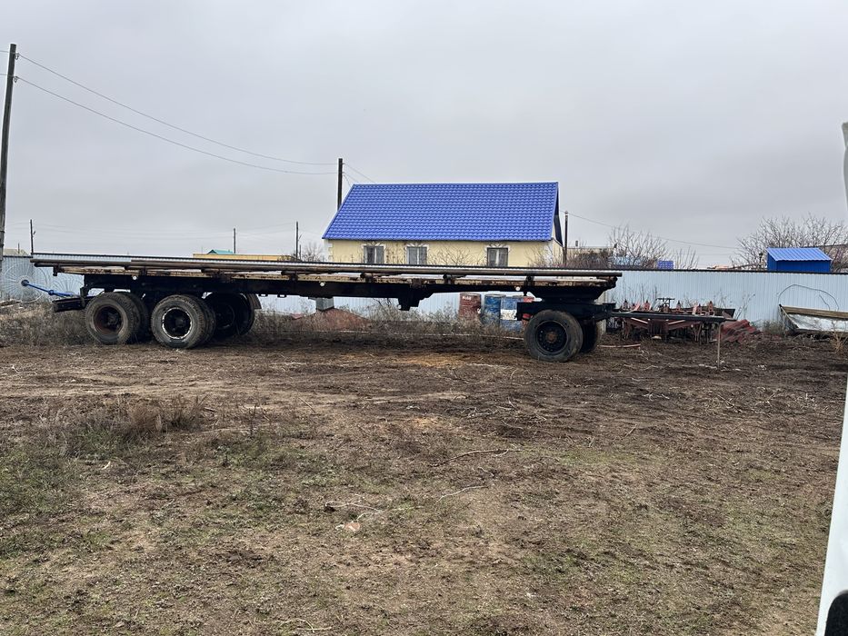 Прицеп трехосник рулоновоз Нефаз