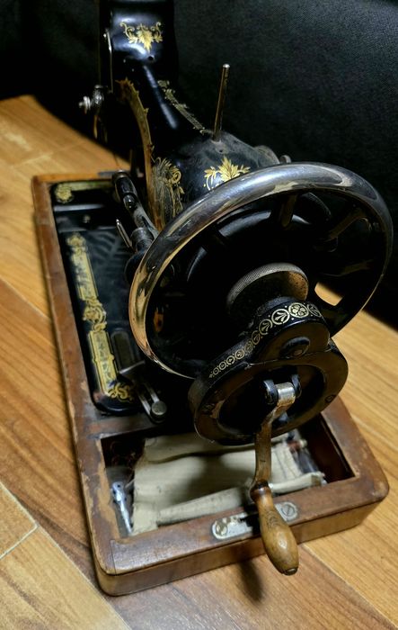 Masina de cusut Singer