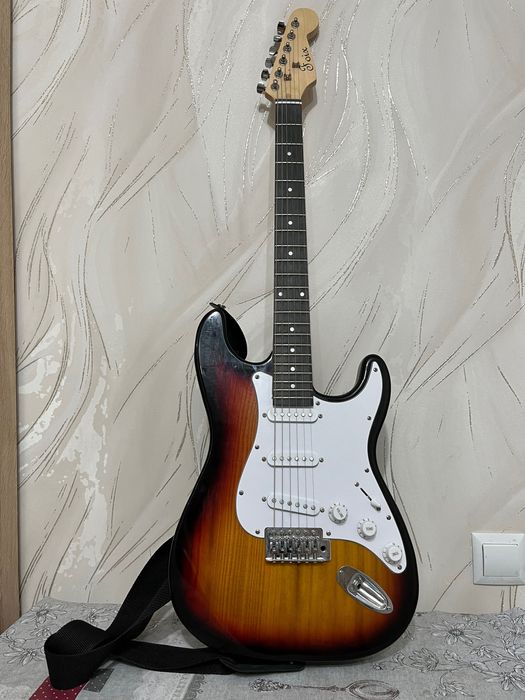 Продам электрогитару с комбоусилителем