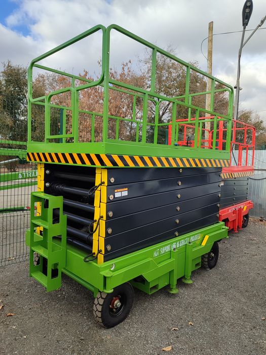 Продам ножничный подъемник