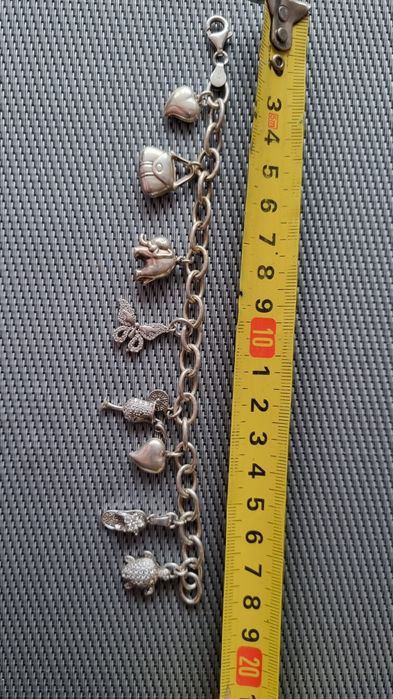 Сребърна гривна с сребърни талисмани