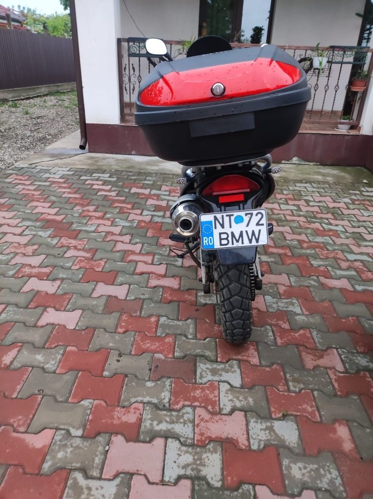 Vând  BMW  650 cm*,kilometri reali