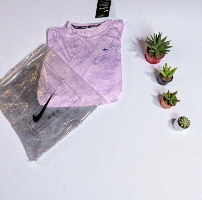 Nike Lilac Graphic Tee – Size M (Fits Like XS)