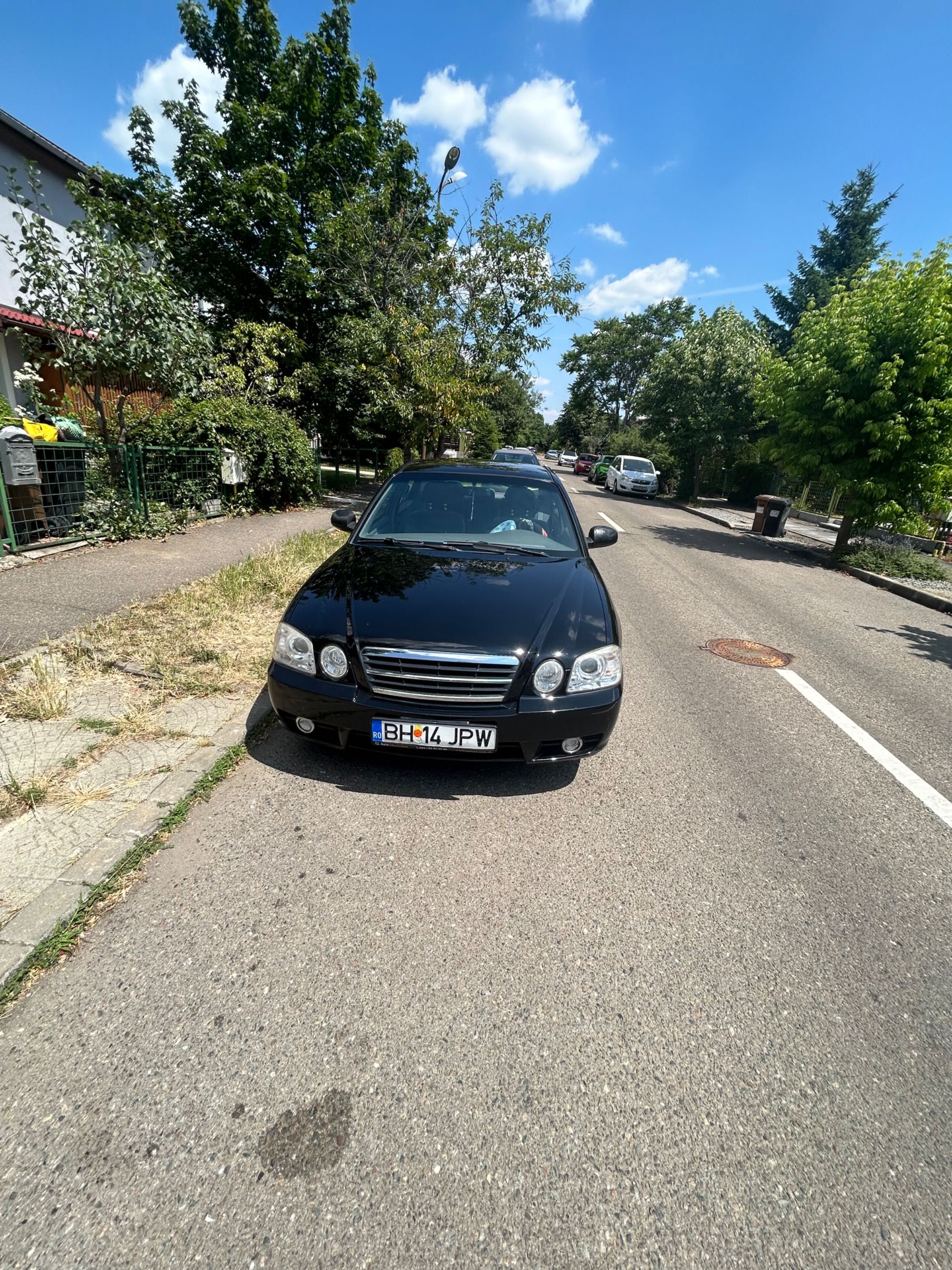 AutoKia Magentis