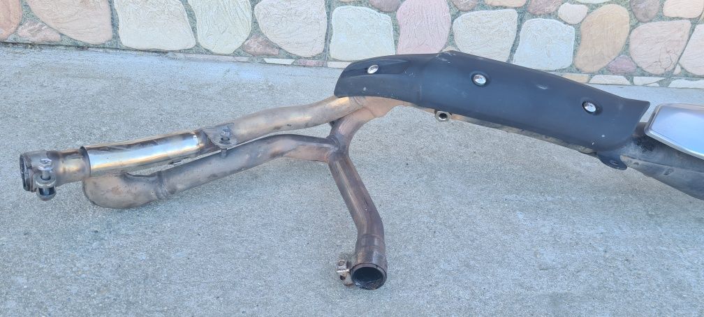 Vând evacuare completa originală Suzuki Vstrom 650