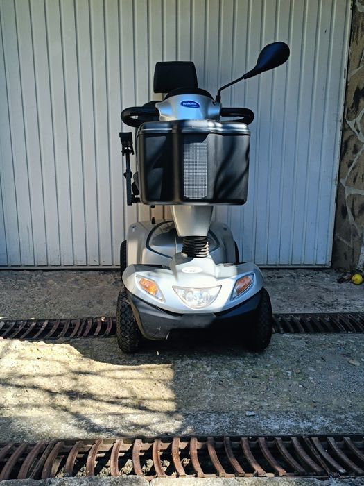 Carucior scuter electric scaun dizabilitati  carut tricieleta handicap