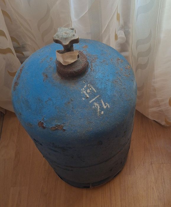 Butelie albastră starea din foto