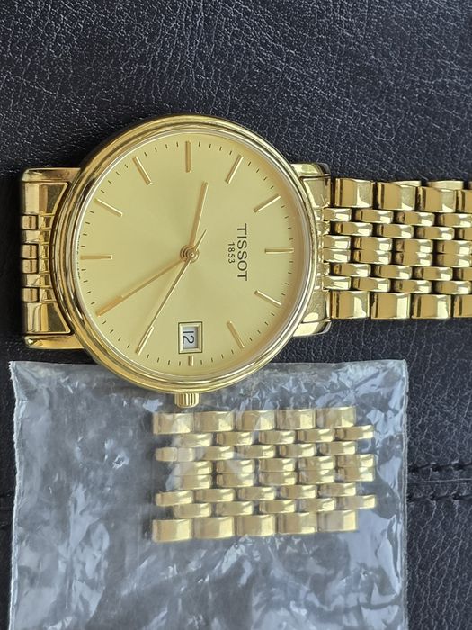 Tissot gold T870/970