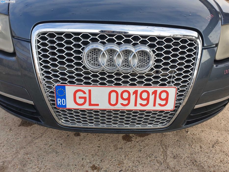 Bara Spoiler Fata Completa cu Grila si Emblema cu Defect Audi A6 C6 NFL Non Facelift 2004 - 2008 Culoare LZ7R [K1890] [K1891] [K1892] [K1893] [K1894] [K1895]