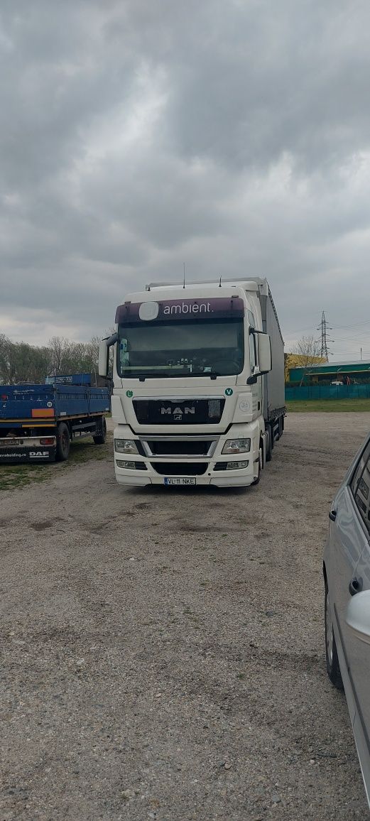 MAN TGX 440 + semiremorca schmitz