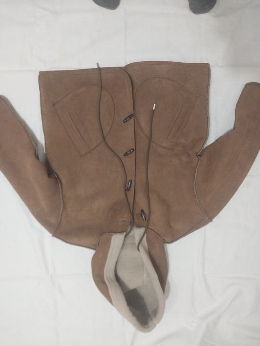 Дубленки с капюшоном женские