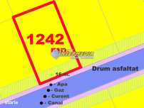 1242 mp Teren Intravilan Deschidere 16 m imprejmuit la asfalt cu toate