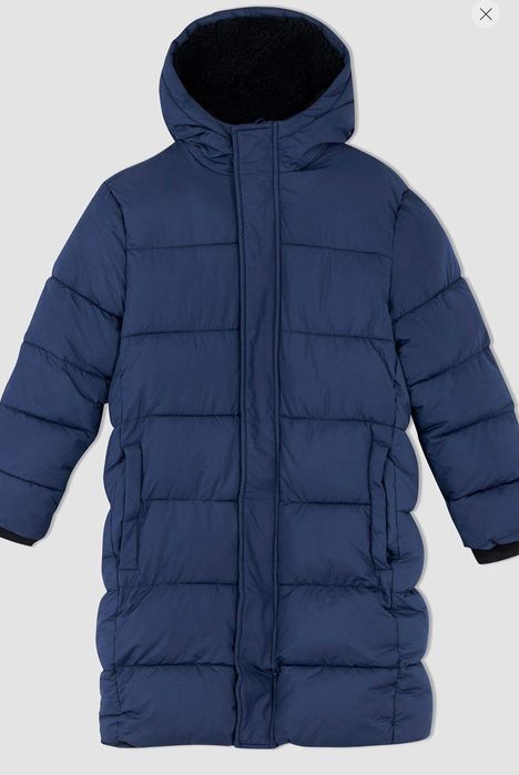 Продам теплую зимнюю куртку на мальчика 9-10 лет