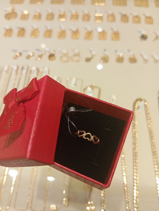 Tilla uzuk 585 proba 100$ yengi